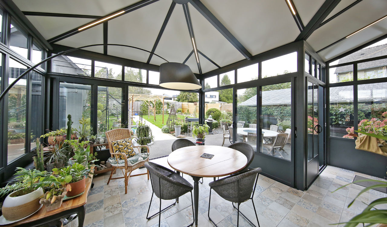 Véranda adossée style atelier à Châteaubourg